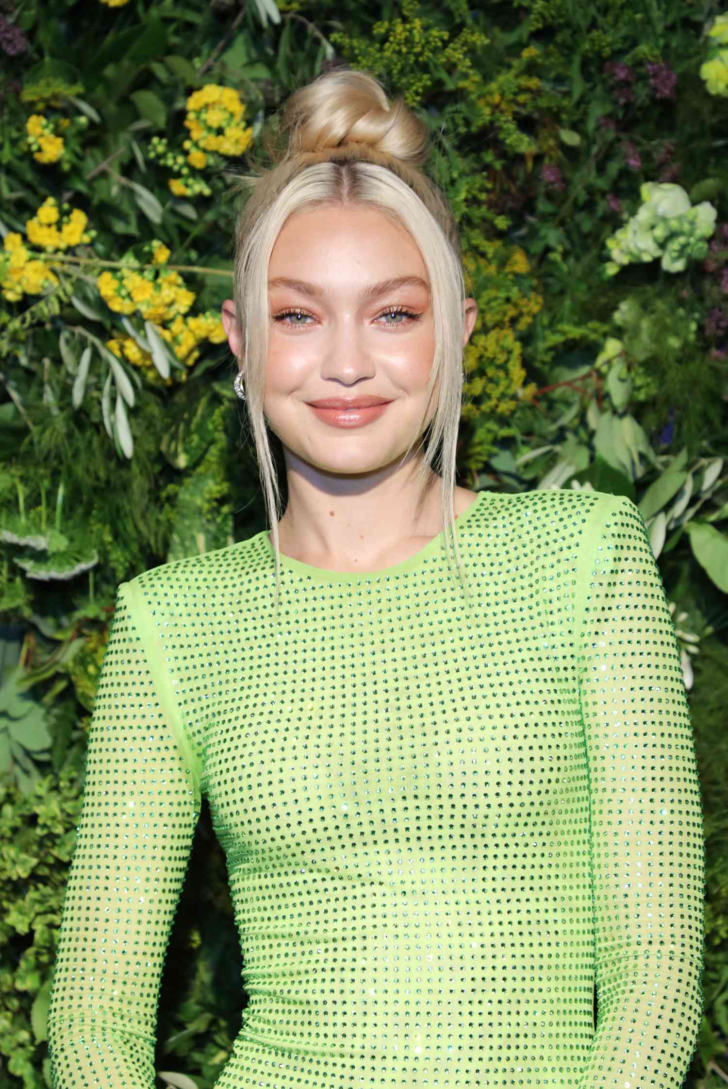 Gigi Hadid wearing a lime green dress with rhinestones 