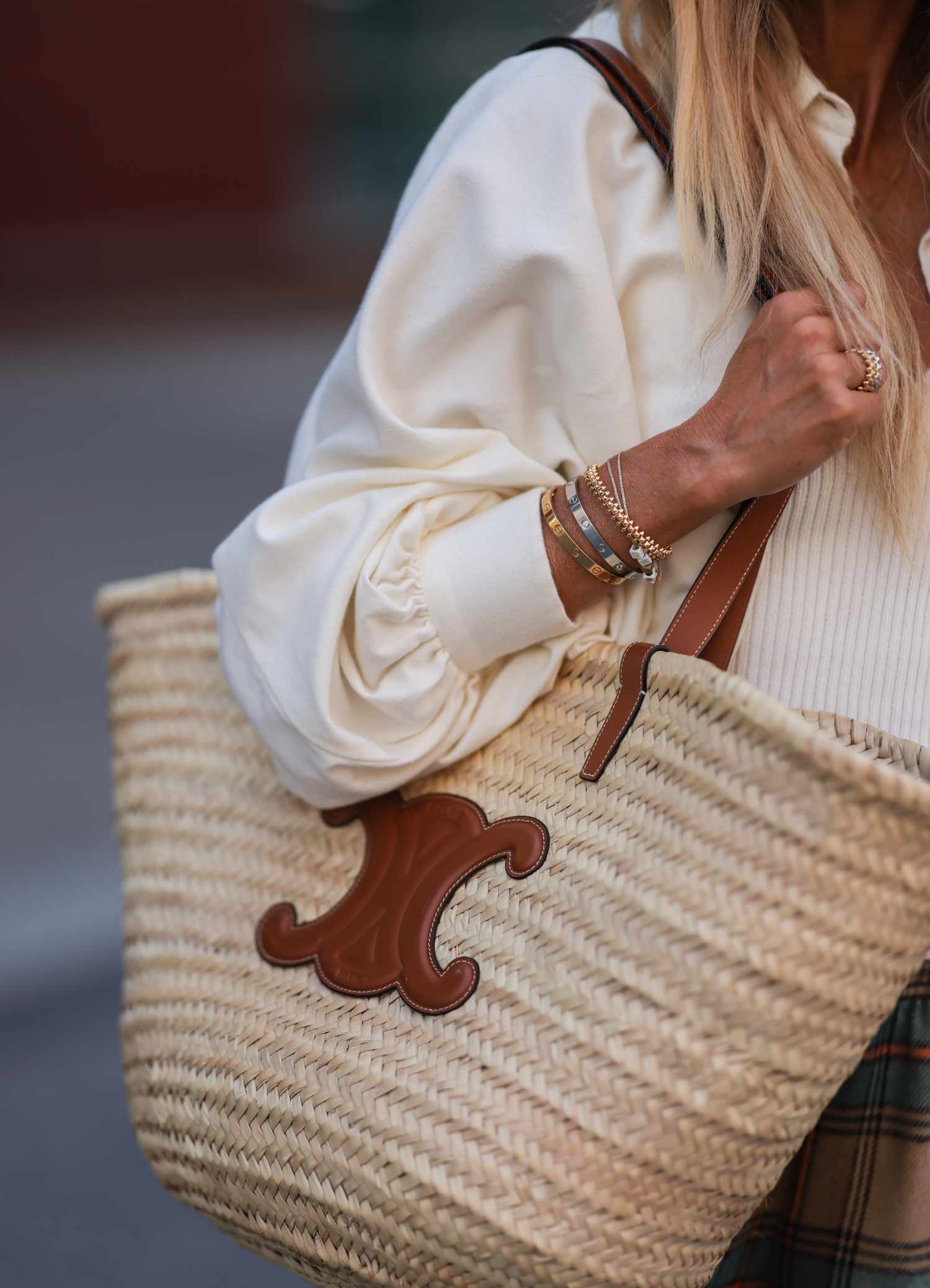 A statement beach bag, a type of fashion accessory for the Cancer zodiac sign.