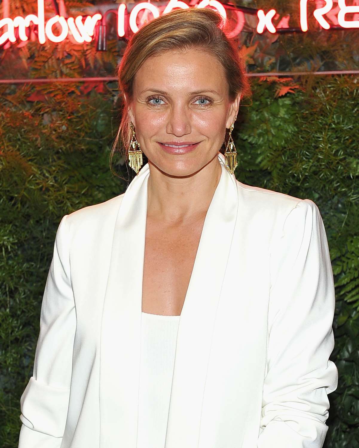 Cameron Diaz wearing a white suit 