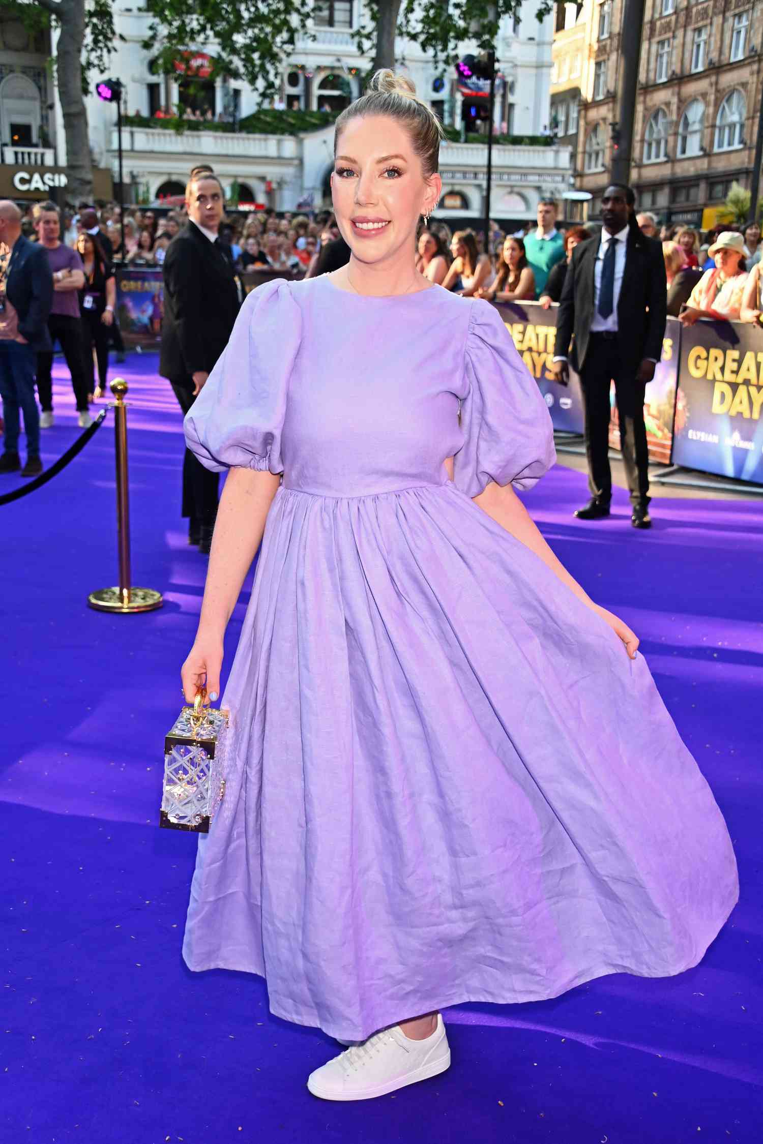 Showing Cancer fashion, Cancer Style, and how to dress like a Cancer zodiac sign, Katherine Ryan wears a nap dress.
