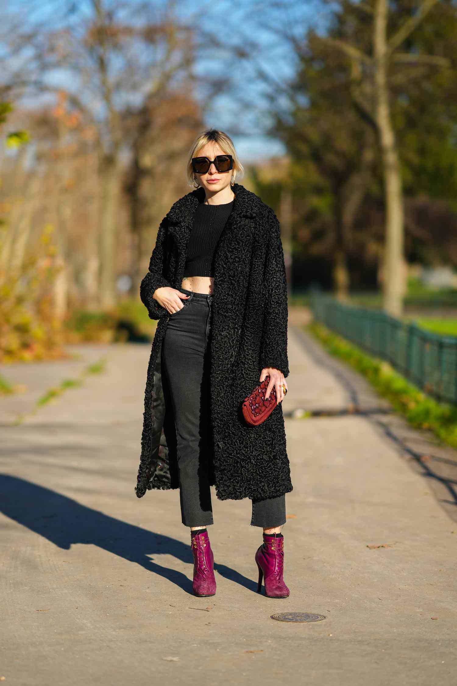 Emy Venturini wears all-black with red accessories, a Libra outfit to try for 2023.