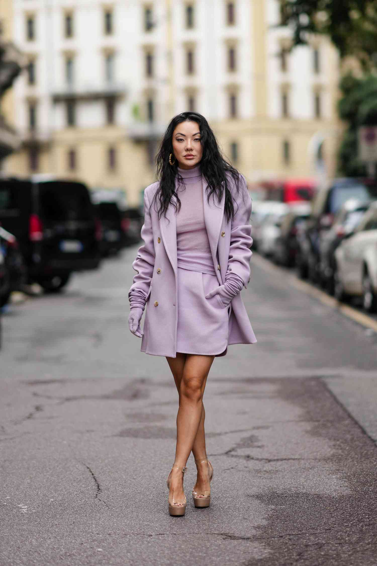 Jessica Wang wears a pale purple skirt suit, a libra outfit idea for 2023.