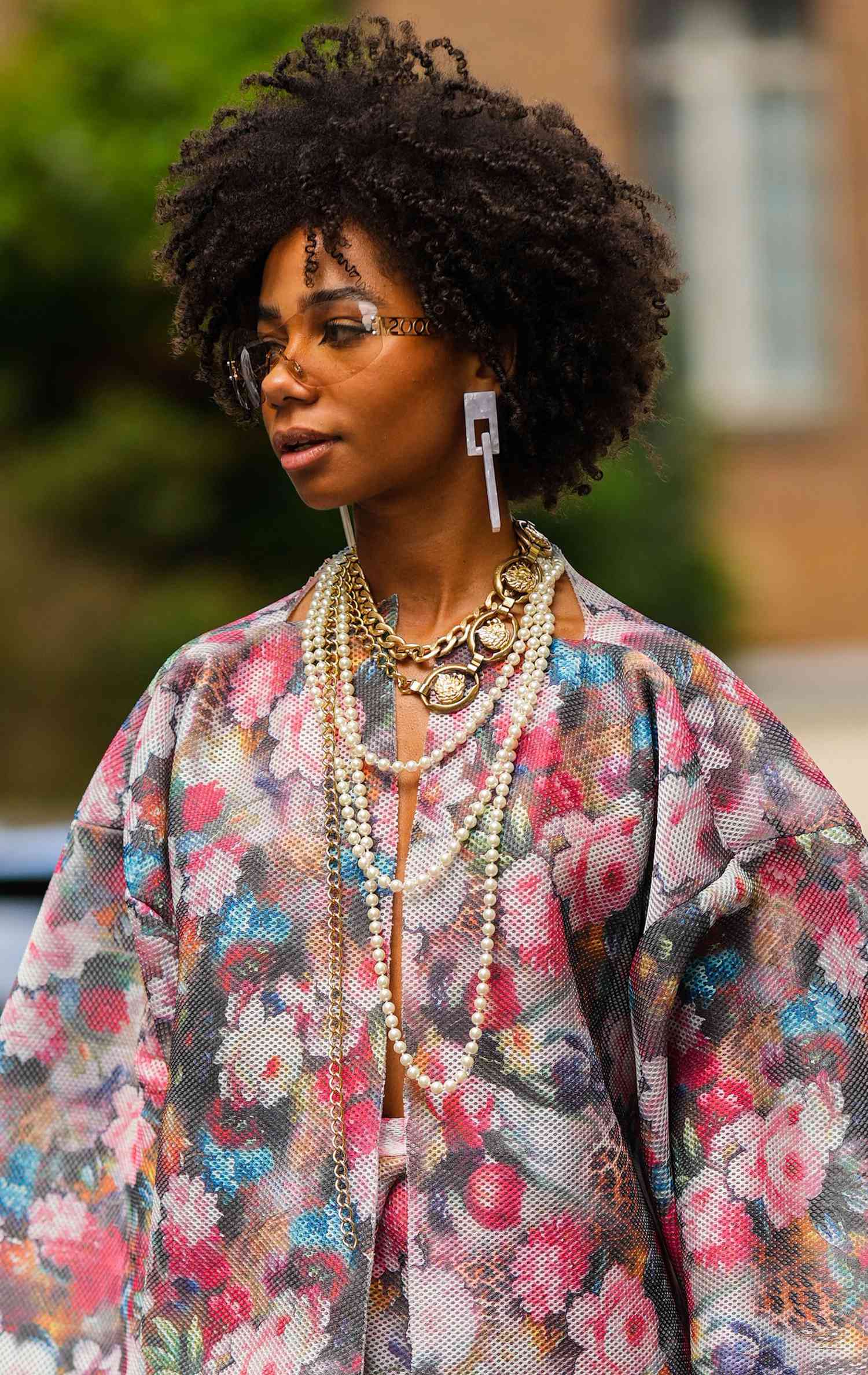 Showing Cancer fashion, Cancer Style, and how to dress like a Cancer zodiac sign, Sarah Monteil wears pearl necklaces and bright colors.