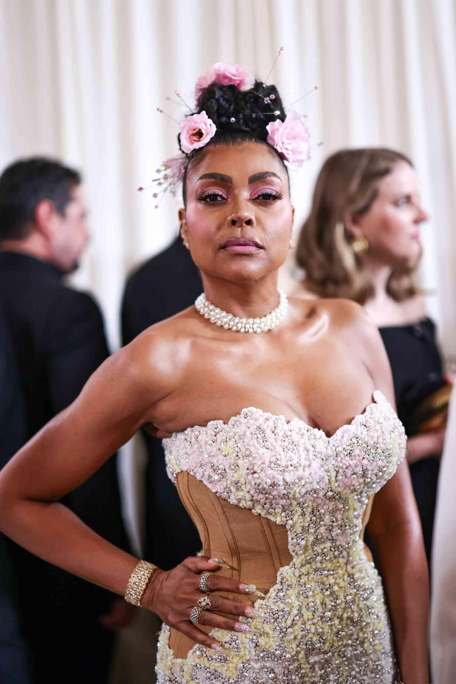 Taraji P. Henson wearing a strapless beaded gown in 2024