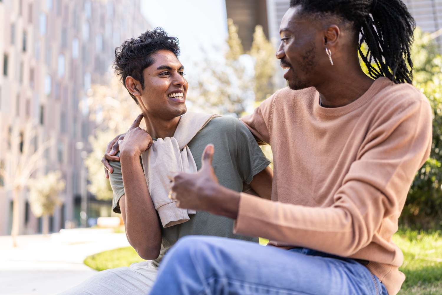 A couple looks at each other while smiles and talking 