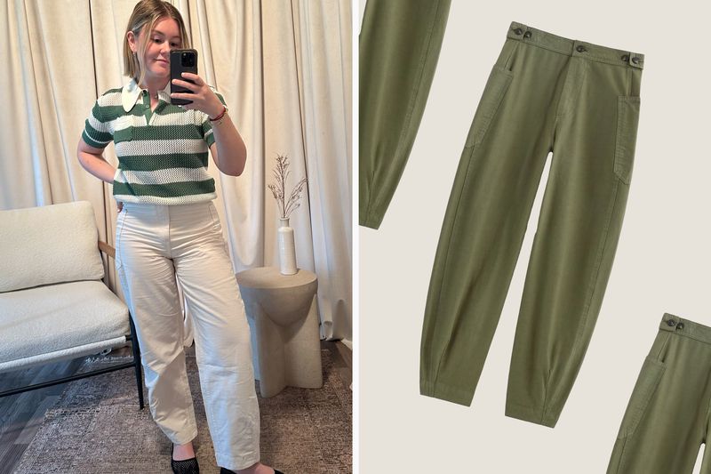 A person taking a mirror selfie wearing cream-colored Everlane Barrel jeans, next to a display of green Everlane Barrel jeans