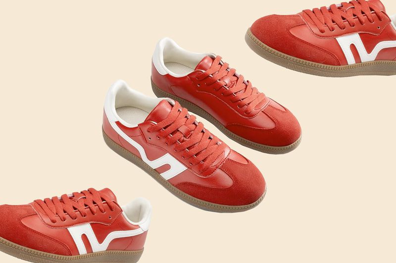 Four pairs of sneakers displayed on a light beige surface, styled to highlight their design and features