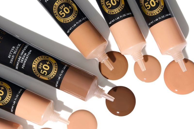 Tubes of SPF 50+ matte foundation with different shades, some dispensed