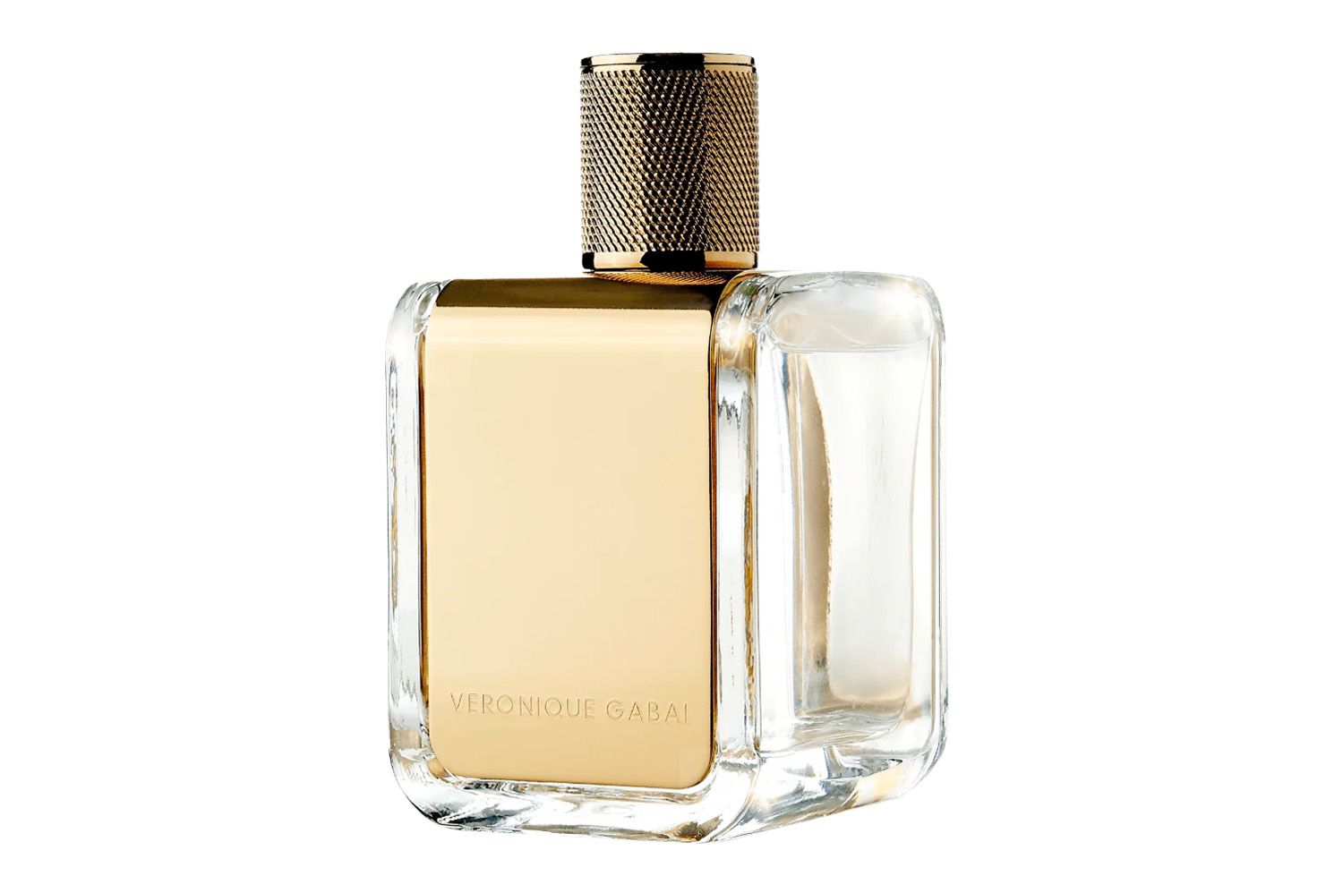 A clear rectangular perfume bottle with a gold front plate and metallic cap, labeled Veronique Gabai
