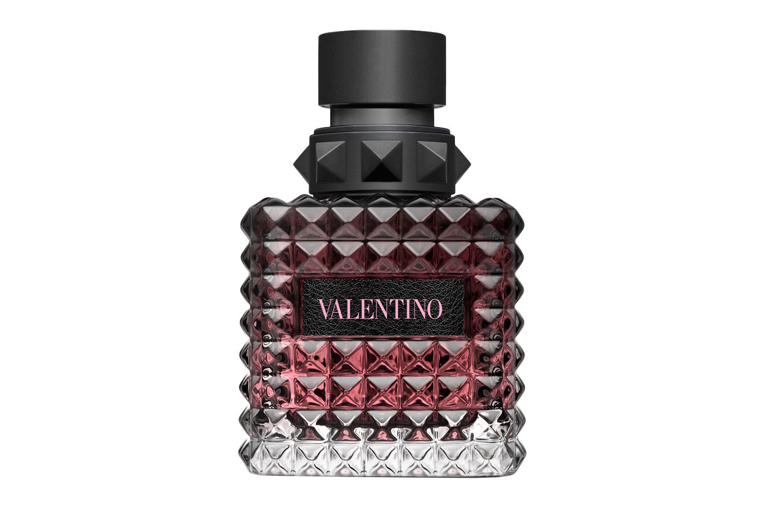 A Valentino branded perfume bottle with a faceted design