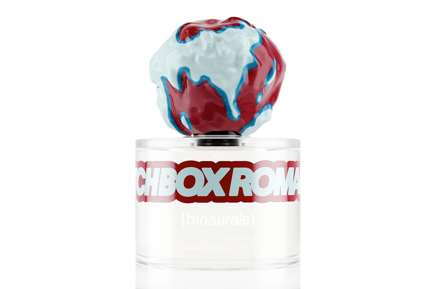 Perfume bottle with a distinctive sculpted cap displayed, labeled as Binaurale
