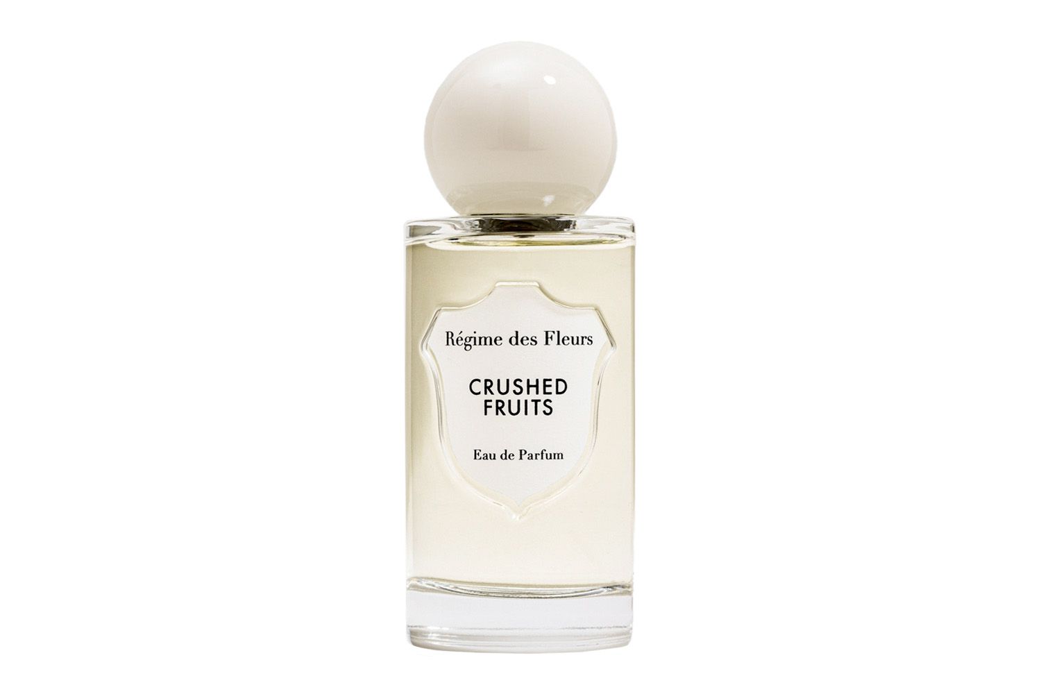 A bottle of Regime des Fleurs Crushed Fruits Eau de Parfum with a round cap