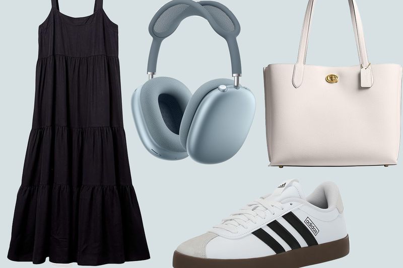 A dress, headphones, a tote bag, and a pair of sneakers are displayed