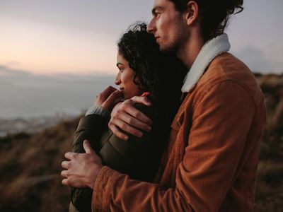 Young Happy Couple at sunset