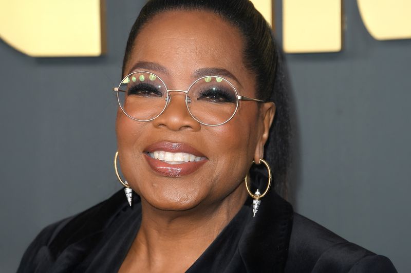 Oprah Winfrey arrives at the Premiere Of Netflix's "The Six Triple Eight"
