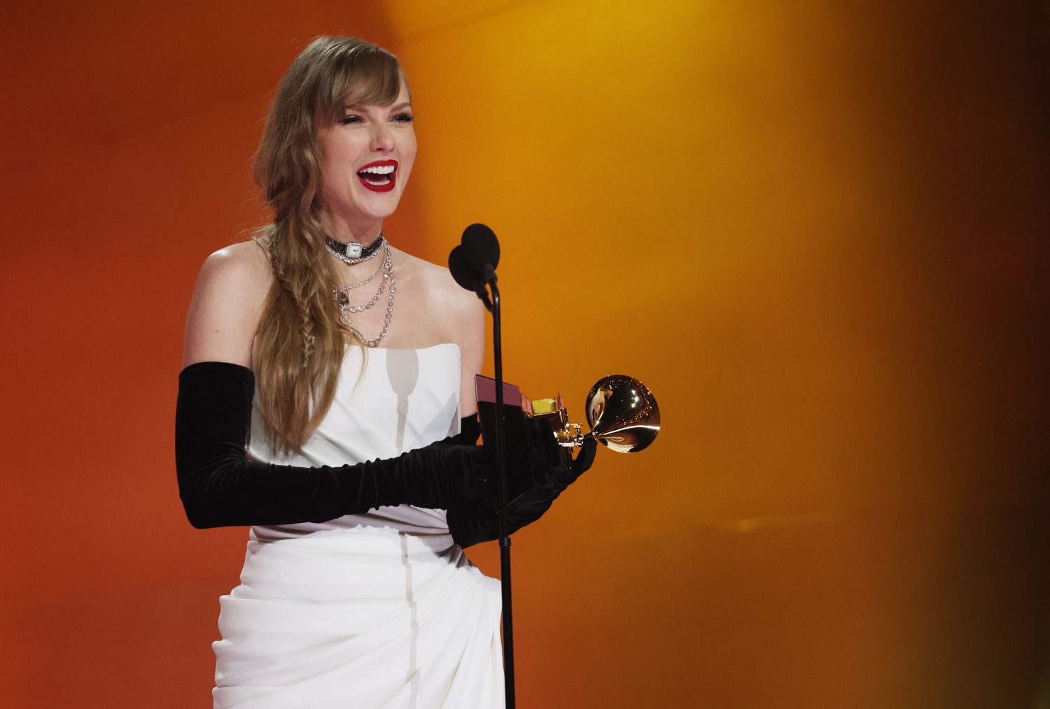 Taylor Swift accepting an award at the 2025 Grammys