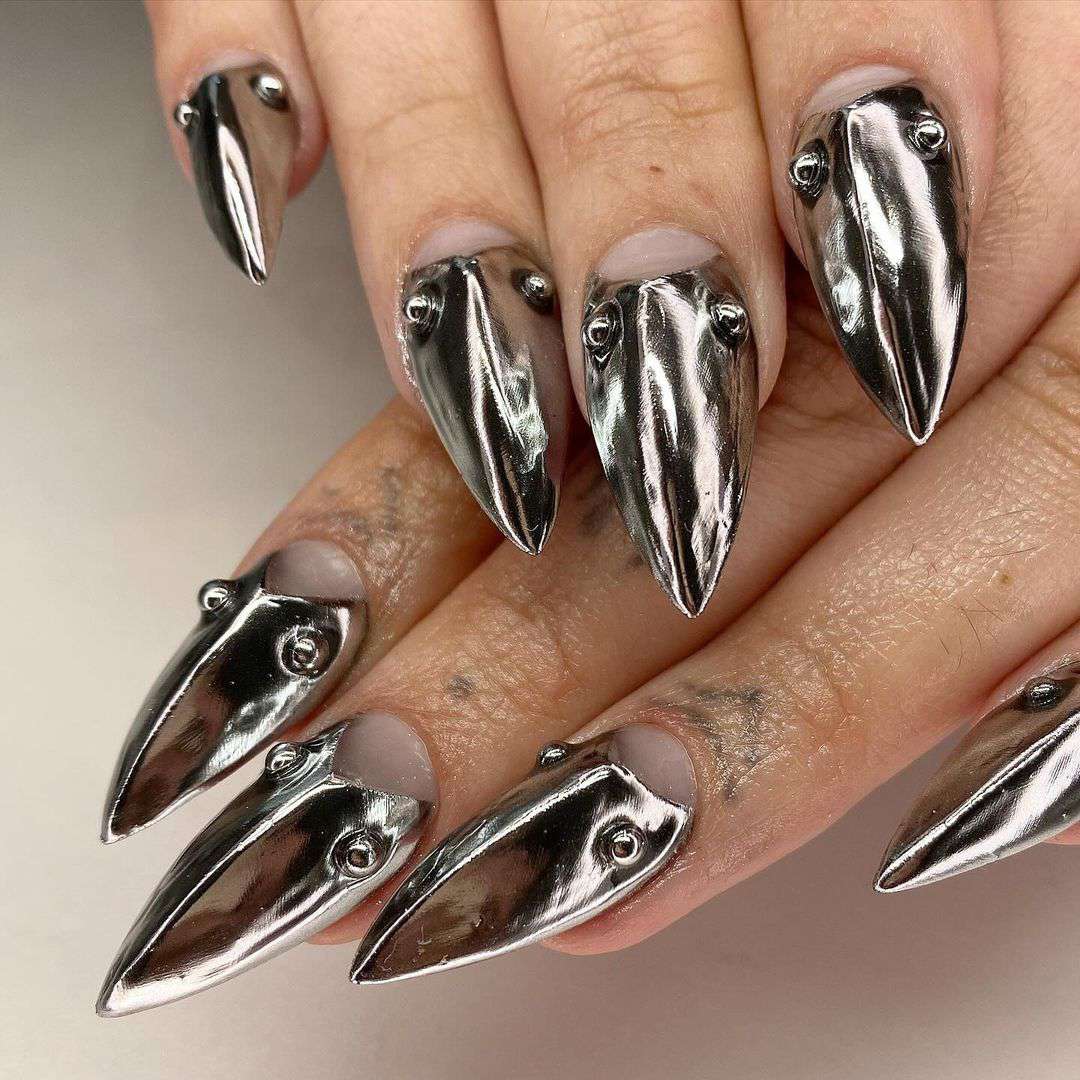 A 3D chrome manicure for Scorpio season.