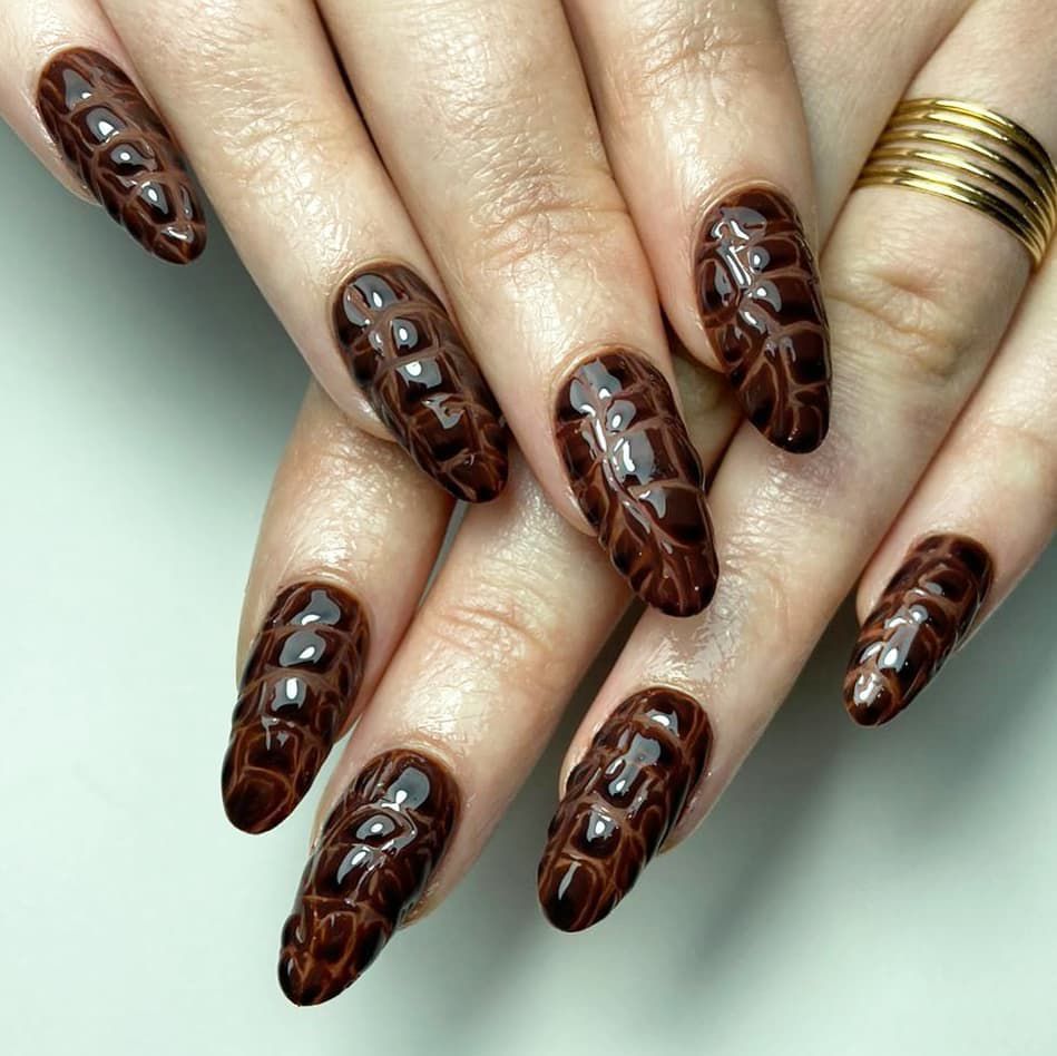 Brown crocodile nails for Scorpio season.