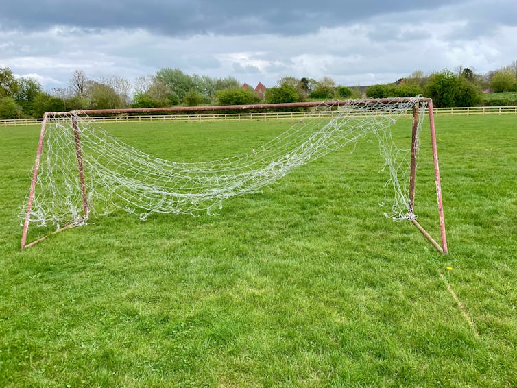 Dilapidated goal in park