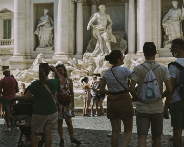 Tourists at the Trevi Fountain.